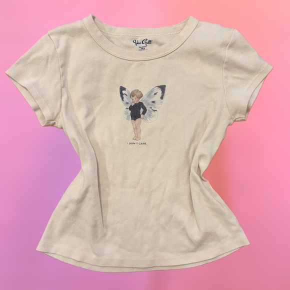 Brandy Melville Tops - Brandy Melville Off White Creme “I don’t care” fairy graphic baby tee, small